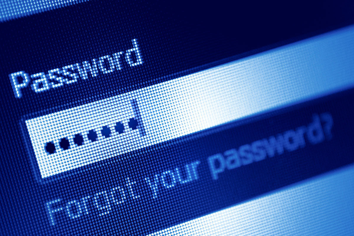 Close-up of a computer screen displaying a password entry field with dots representing hidden characters and a "Forgot your password?" link below it, all in a blue digital interface.